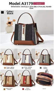 Detailed view of woven texture and detachable strap on this stylish bucket handbag