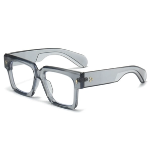 Modern oversized square transparent grey glasses frame with gold arrow metal accents