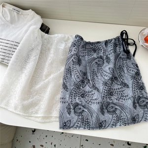 White lace layering skirt extender with grey peacock pattern for leggings outfits