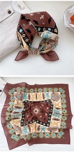 Detail of vintage folk pattern cotton square scarf with tribal motifs and bird prints