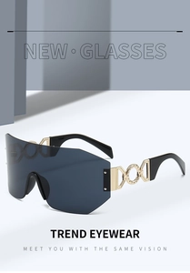 Detailed view of oversized rimless sunglasses featuring golden hollow CD logo on temple