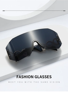 Detail view of rimless sports sunglasses with metal rivets and dark shield lens