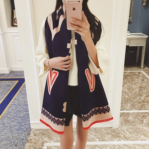 Navy blue knitted scarf with pink geometric blocks and red heart patterns with tassels