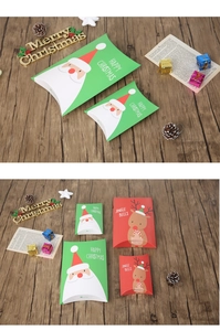 Detailed view of Christmas pillow gift boxes with Santa and Reindeer holiday designs