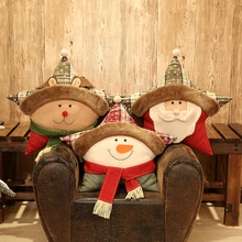 Three festive star-shaped Christmas plush pillows with Santa, Snowman and Reindeer designs