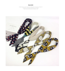 Assorted cotton linen silk scarves featuring diverse patterns with silver metal buckle rings