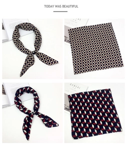 Detail of square silk scarf with geometric patterns and elegant decorative leather buckle
