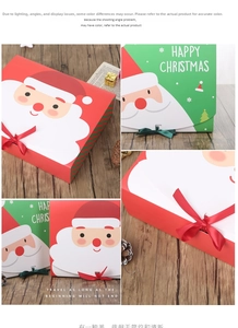 Detail of red and green Christmas gift boxes featuring Santa Claus and ribbon bows
