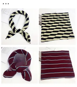 Detail showing elegant striped cotton linen scarves and polished diamond leather buckles