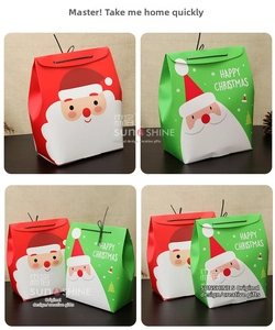 Detail of red and green Christmas gift boxes with Santa Claus and festive handles