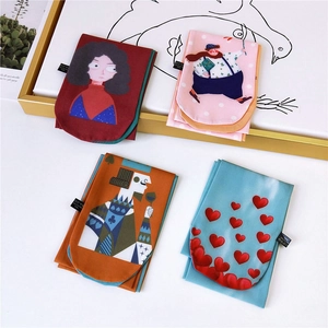 Chic women's scarf set featuring artistic cartoon prints and colorful patterns