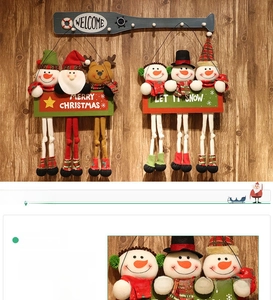 Detail view of Merry Christmas door hanger showing Santa, Snowman and Elk in 63cm height