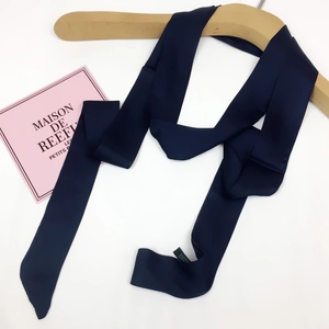 Navy blue satin skinny scarf for women, long silk ribbon accessory on white background