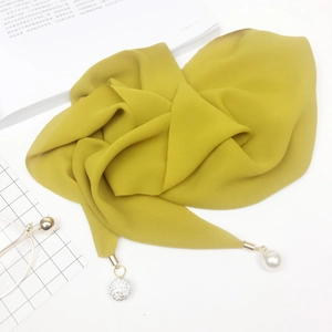 Solid mustard yellow chiffon scarf featuring elegant pearl and rhinestone pendant accents