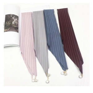 Striped neck scarves with pearl and crystal pendant charms in four distinct colors