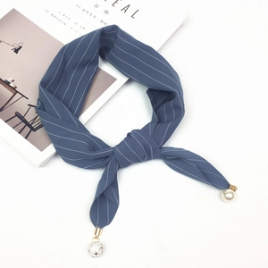 Navy blue striped silk scarf featuring elegant pearl and rhinestone sphere pendants