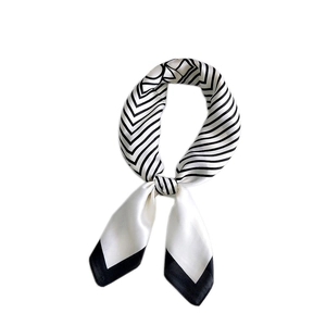 Elegant black and white geometric striped silk scarf for women in professional styling
