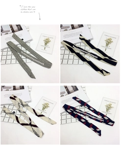 Detail view of four patterned skinny twilly scarves with rhinestones and polka dots