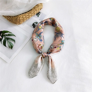 Elegant floral silk scarf with hand-painted patterns on light pink base for neck or hair