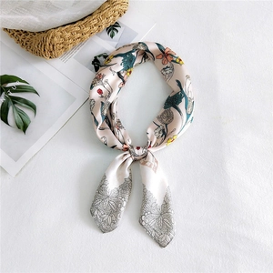 Floral square silk scarf with hand-painted lilies and natural props on white fabric