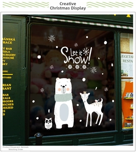 Detailed Christmas window decals featuring polar bears, reindeer, and snowflakes motifs