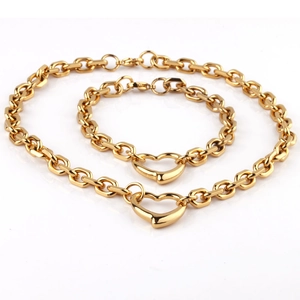 Polished golden stainless steel jewelry set with heart pendant necklace and bracelet