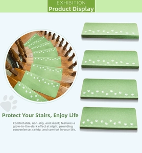 Detail showing non-slip stair mat with luminous paw pattern for safety and noise reduction