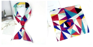 Détail d'un foulard en soie rétro à motif de peinture abstraite avec finition satinée mate