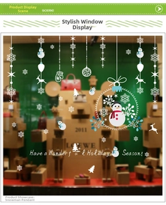 Detailed Christmas window decals featuring snowmen, snowflakes, and festive holiday text