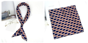 Détail d'un foulard carré en soie vintage avec motif de chaîne géométrique satiné