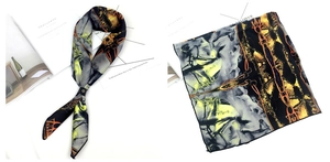 Détail de l'imprimé équestre classique avec chevaux et chaînes sur foulard en satin
