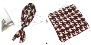 Détail d'un foulard en soie pied-de-poule bordeaux montrant drapé et texture