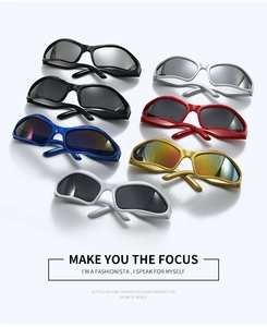 Close-up of sporty wrap-around sunglasses in multiple colors like silver, red, and blue