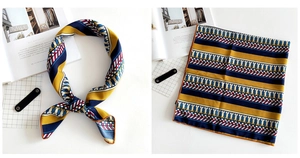Detailed macro view of linen square scarf featuring navy and yellow geometric stripes