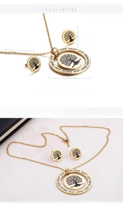 Detailed view of 18K gold plated Tree of Life necklace and earrings with engraved ring