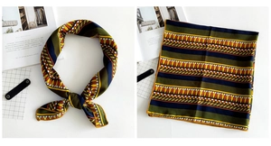 Detail view of square linen scarf with geometric pattern in green and navy tones