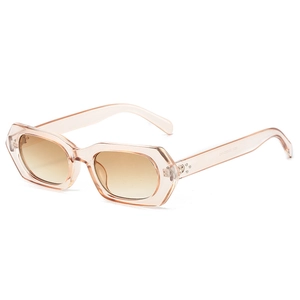 Polygonal champagne pink sunglasses with geometric frames and brown gradient lenses