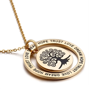 Golden Tree of Life necklace with Dream Hope Trust Love engraving on a white background