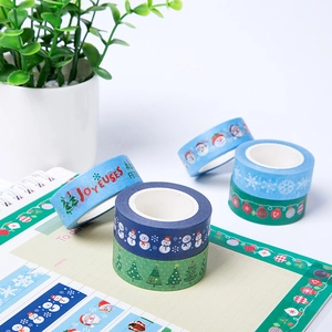 Christmas washi tape set featuring snowman and tree patterns for DIY scrapbooking
