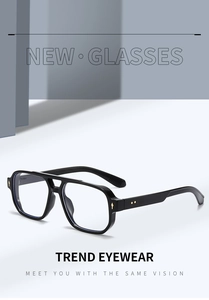 Detail view of square black frame glasses with iconic double bridge and gold rivets