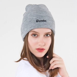 Gray Dreken ribbed knit beanie with black embroidered letter script for outdoor warmth