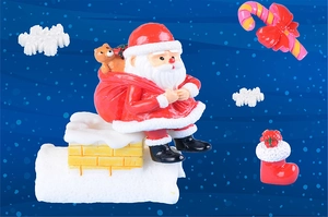Detailed Christmas resin ornament featuring Santa on a chimney with candy canes and gifts