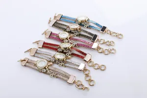 Close-up of glitter strap quartz watches with gold metal chain in six vibrant colors