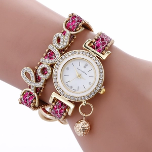 Golden wrap bracelet watch for women with pink braided band and sparkling LOVE charm