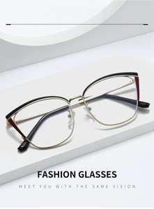 Macro shot of stylish dual-tone cat-eye frames and slim golden metal temples for women
