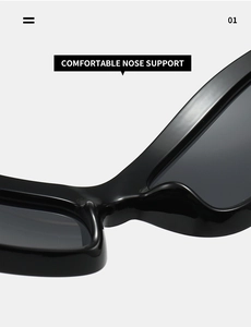 Detailed macro view of the integrated comfortable nose pads on black Y2K sports sunglasses