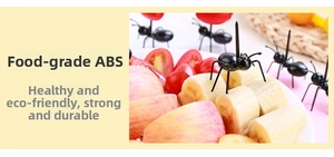 Detail showing creative black ant-shaped fruit forks made of food-grade ABS material