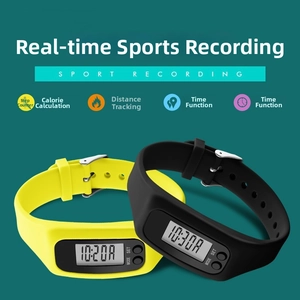Detail view of silicone sports pedometer with digital LCD display and physical mode buttons