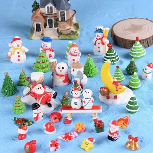 Miniature Christmas resin figurines set with Santa and Snowman for holiday home decor