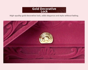 Macro detail of rose velvet jewelry box featuring embossed patterns and gold arc clasp